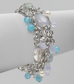 From the Bijoux Collection. A tangle of textural sterling silver chains are richly punctuated by blue and aqua chalcedony and pearl.Blue and aqua chalcedony and pearl Sterling silver Length, about 7 Toggle closure Imported