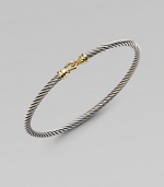 From the Cable Collectibles Collection. A thin band of signature twisted cable with 18K gold buckle.18K gold Sterling silver Width, about 3mm Hook closure Imported 