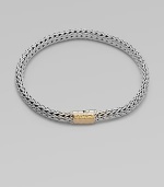 From the Bedeg Collection. A braided sterling silver chain with a beautifully radiant 18k gold station closure. 18k goldSterling silverLength, about 7¼Push clasp closureImported 