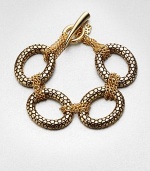 Large textured links accented with smaller wrapped link chains create an unique piece you'll wear again and again. Antique-finished goldtoneLength, about 7.75Toggle closureImported 