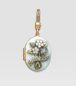 Aquamarine-colored CRYSTALLIZED - Swarovski Elements sparkle on this handcrafted, hand-enameled birthstone locket that opens to hold a favorite photo. Crystal Enamel 18k goldplated brass & brass-plated pewter Month indicated on the back Length, about 1¼ Width, about 1 Spring clip clasp Made in USA