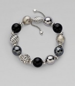 From the Elements Collection. Perfect mix of textures, this beaded design pairs black onyx, hematite and sterling silver.Hematite Black onyx Sterling silver Length, about 7½ Adjustable oval bead clasp Imported 