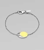 From the Eclipse Collection. A modern update of the classic ID bracelet, offering a slanted oval disk on a graceful chain.Sterling silverGoldplatedLength, about 7Disc length, about ¾Lobster claspImported