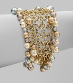 A chain link design embellished with multi-colored glass pearls. BrassGlass pearlsLength, about 7½Magnetic clasp closureImported 