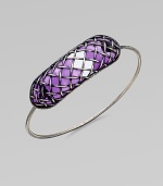 A bold, yet sleek style with a unique lattice pattern over glossy, colored glass. GlassSilverDiameter, about 2.5Hidden closureMade in Italy