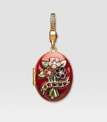 Garnet-colored CRYSTALLIZED - Swarovski Elements sparkle on this handcrafted, hand-enameled birthstone locket that opens to hold a favorite photo. Crystal Enamel 18k goldplated brass & brass-plated pewter Month indicated on the back Length, about 1¼ Width, about 1 Spring clip clasp Made in USA