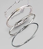 A slender sterling silver bangle accented with five radiant diamonds. Diamonds, 0.15 tcw Sterling silver Diameter, about 2½ Imported Please note: Bracelets sold separately.