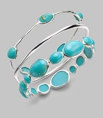 From the Scultura Collection. Subtly hammered sterling silver is dotted with smooth, vibrant stones of turquoise cabochon.Turquoise cabochon Sterling silver Diameter, about 2½ Imported