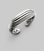 A sensuously curved fluted cuff of polished sterling silver is a fresh take on Yurman's signature cable. Sterling silver Diameter, about 2¼ Width, about 1 Imported