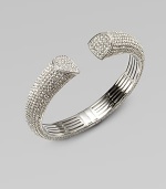 EXCLUSIVELY AT SAKS. A beautiful, dazzling, pavé crystal piece with chic angled end caps. CrystalsRhodium plated brassDiameter, about 2¼Width, about ½Hinged closureImported 
