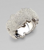 An arresting design that dazzles in plated rhodium. Brass Hinged, box and tongue closure Diameter, about 2¼ Width, about 1¼ Imported 