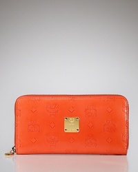 Practical style gets a hit of color with this logo-embossed wallet from MCM. Designed with pockets to hold your daytime essentials, it's an accessory you'll reach for again and again. Practical style gets a hit of color with this logo-embossed wallet from MCM. Designed with pockets to hold your daytime essentials, it's an accessory you'll reach for again and again.