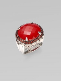 From the Batu Bamboo Collection. A substantial faceted oval of rich red coral sits in a bold bamboo-detailed sterling silver ring, edged by deeply colored pavé garnets. Red coral and garnet Sterling silver Width, about 1 Made in Bali From the Batu Bamboo Collection. A substantial faceted oval of rich red coral sits in a bold bamboo-detailed sterling silver ring, edged by deeply colored pavé garnets. Red coral and garnet Sterling silver Width, about 1 Made in Bali