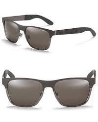 Sleek thin wayfarers with a two-tone frame, Yves Saint Laurent's modern take on a classic silhouette. Sleek thin wayfarers with a two-tone frame, Yves Saint Laurent's modern take on a classic silhouette.