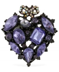 A heartfelt gesture. This stretch ring from Betsey Johnson is crafted from hematite-tone mixed metal with purple glass crystal gems and a bow accent on top to enhance the appeal. Size 7-1/2. A heartfelt gesture. This stretch ring from Betsey Johnson is crafted from hematite-tone mixed metal with purple glass crystal gems and a bow accent on top to enhance the appeal. Size 7-1/2.