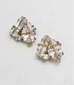 This sparkling cluster design features a delicate, wrapped link chain. Glass stonesGoldtoneSilvertoneSize, about .75Post backImported 