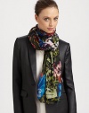 A blooming, vibrant floral print adorns luxurious silk for a stylish wrap.SilkAbout 70 X 180Dry cleanMade in Italy