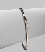 A chic, curved bar on a narrow link chain accented with a logo charm for a sleek design. Ruthenium-plated brassLength, about 7Lobster clasp closureMade in Italy