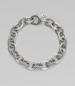 Alternating smooth and cable links create a bracelet that's both classic and of-the-moment with true Yurman style. Sterling silver Length, about 7¼ Spring ring clasp Imported