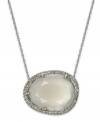 Inspired by nature, this stunning pendant highlights an organically-shaped moonstone (7-5/8 ct. t.w.) surrounded by round-cut diamonds (1/4 ct. t.w.). Set in sterling silver. Approximate length: 18 inches. Approximate drop: 1/2 inch.