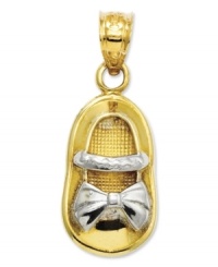 Commemorate your brand new bouncing baby girl. This precious charm features a baby shoe in 14k gold with rhodium ribbon and strap details. Chain not included. Approximate length: 1 inch. Approximate width: 2/5 inch. Commemorate your brand new bouncing baby girl. This precious charm features a baby shoe in 14k gold with rhodium ribbon and strap details. Chain not included. Approximate length: 1 inch. Approximate width: 2/5 inch.