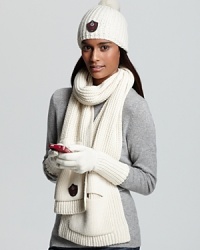 Store away winter's hidden treasures in the pockets of this cozy knit scarf from UGG® Australia. Store away winter's hidden treasures in the pockets of this cozy knit scarf from UGG® Australia.