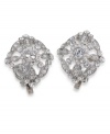 Dare to be dramatic. These large crystal earrings by Carolee feature an intricate square-shaped pattern set in silver tone mixed metal with clip on backing. Approximate diameter: 7/8 inch.