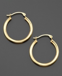 Polished hoop earrings crafted in 14k gold are the perfect addition to your everyday look. Approximate diameter: 1/2 inches. Polished hoop earrings crafted in 14k gold are the perfect addition to your everyday look. Approximate diameter: 1/2 inches.