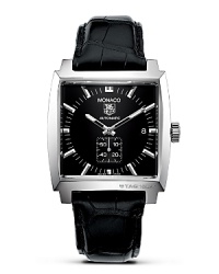In 1969, TAG Heuer broke with tradition by creating the first square-cased, water-resistant watch in the history of watchmaking. Powered by the famous Chronomatic Calibre 11, the Monaco is also the world's first automatic chronograph. With black dial and a polished steel bezel. Features a date window. In 1969, TAG Heuer broke with tradition by creating the first square-cased, water-resistant watch in the history of watchmaking. Powered by the famous Chronomatic Calibre 11, the Monaco is also the world's first automatic chronograph. With black dial and a polished steel bezel. Features a date window.