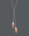 Add a delicate layer for an ultra-chic look. Studio Silver's contemporary pendant features two delicate sterling silver chains that highlight leaf-shaped charms in 18k gold over sterling silver. Approximate length: 16 inches. Approximate chain drops: 2-1/2 inches and 2 inches.  Approximate charm drop: 1 inch.