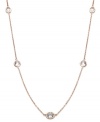 Layer yourself with inches of sparkle. This delicate necklace is crafted in 14k rose gold over sterling silver, with round-cut white topaz stations (9 ct. t.w.). Approximate length: 36 inches.
