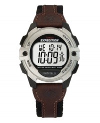 Hit the trail or the track with this rugged Expedition watch by Timex. Brown leather and black canvas strap with round black and silver resin case. Silver tone digital display dial features initial time, day, date and seconds. Quartz movement. Water resistant to 100 meters. One-year limited warranty. Hit the trail or the track with this rugged Expedition watch by Timex. Brown leather and black canvas strap with round black and silver resin case. Silver tone digital display dial features initial time, day, date and seconds. Quartz movement. Water resistant to 100 meters. One-year limited warranty.
