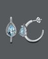 A traditional hoop earring with an extra touch of shine. Victoria Townsend's elegant design highlights a pear-cut blue topaz (4 ct. t.w.) surrounded by sparkling diamond accents. Crafted in sterling silver. Approximate diameter: 7/8 inch.