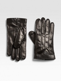 A cold weather favorite, shaped in rich Italian leather with a cashmere lining and a triangular-shaped logo accent.About 10 longCashmere linedLeatherDry cleanMade in Italy A cold weather favorite, shaped in rich Italian leather with a cashmere lining and a triangular-shaped logo accent.About 10 longCashmere linedLeatherDry cleanMade in Italy