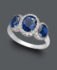 A sumptuous three stone design in brilliant blue hues. Effy Collection's standout ring highlights oval-cut sapphires (2-7/8 ct. t.w.) encircled by round-cut diamonds (1/3 ct. t.w.) set in 14k white gold. A sumptuous three stone design in brilliant blue hues. Effy Collection's standout ring highlights oval-cut sapphires (2-7/8 ct. t.w.) encircled by round-cut diamonds (1/3 ct. t.w.) set in 14k white gold.