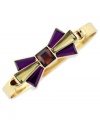 Tie something new. This bracelet from BCBGeneration is crafted from gold-tone mixed metal with faceted stones in light topaz and shades of purple to make up a stylish bow. Approximate length: 8 inches. Approximate diameter: 2-1/2 inches.