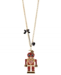 This robot has found love. Betsey Johnson's cute pendant necklace features a long chain displaying a fuchsia glitter robot pendant with blue crystal eyes, pink crystal hearts and gold tone details. A black bow and heart finish off the adorable look. Crafted in antique gold tone mixed metal. Approximate length: 31 inches. Approximate drop: 3 inches. This robot has found love. Betsey Johnson's cute pendant necklace features a long chain displaying a fuchsia glitter robot pendant with blue crystal eyes, pink crystal hearts and gold tone details. A black bow and heart finish off the adorable look. Crafted in antique gold tone mixed metal. Approximate length: 31 inches. Approximate drop: 3 inches.