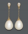 Sophisticated style perfect for the office or an evening out. Elegant drops feature cultured freshwater pearls (8 x 11 mm) strung from delicate chains crafted in 14k gold with sparkling diamond-accented posts. Approximate drop: 1-1/10 inches.