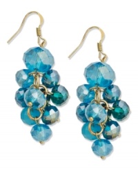 Glitz and glamour at the drop of a hat. These c.A.K.e. by Ali Khan earrings feature clusters of turquoise glass beads in a gold tone mixed metal setting. Approximate drop: 2 inches. Glitz and glamour at the drop of a hat. These c.A.K.e. by Ali Khan earrings feature clusters of turquoise glass beads in a gold tone mixed metal setting. Approximate drop: 2 inches.
