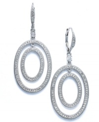 Other-worldly elegance. Eliot Danori's orbital drop earrings exude style and grace with the addition of sparkling crystal accents. Set in rhodium-plated mixed metal. Approximate drop: 2 inches. Other-worldly elegance. Eliot Danori's orbital drop earrings exude style and grace with the addition of sparkling crystal accents. Set in rhodium-plated mixed metal. Approximate drop: 2 inches.