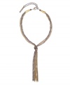 Illuminate a deep V with flair and fringe. You'll stay on-trend in tassels with BCBGeneration's chic, tri tone necklace crafted from silver, gold, and hematite tone mixed metal chains. Approximate length: 16 inches. Approximate drop: 7 inches.