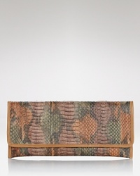 Take the textured leather trend out for the evening with this snakeskin clutch from Carlos Falchi. Ideally sized for the essentials, it's a must for the nocturnal creature. Take the textured leather trend out for the evening with this snakeskin clutch from Carlos Falchi. Ideally sized for the essentials, it's a must for the nocturnal creature.