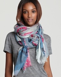 An abstract geometric print in gray, pink and blue dances across this super-soft scarf from Emilio Pucci. An abstract geometric print in gray, pink and blue dances across this super-soft scarf from Emilio Pucci.
