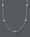 Wrap yourself in three feet of luxurious sparkle! Trio by Effy Collection's necklace features 24 stations of round-cut, bezel-set diamonds (1-7/8 ct. t.w.) strung on a delicate 14k white gold chain. Approximate length: 36 inches.