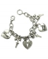 Spread the love. This five-charm bracelet from GUESS is crafted from silver-tone mixed metal, with glass  crystals and jet accents providing a stylish touch. Item comes packaged in a signature GUESS Gift Box. Approximate length: 7-1/2 inches. Approximate diameter: 1-1/2 inches. Approximate drop: 1 inch.