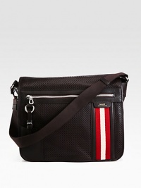 A handsome crossbody bag in perforated calfskin leather with a simple foldover flap and signature trainspotting web detail. Front flap Adjustable shoulder strap Interior, exterior zip pockets 14½W X 11¾H X 4¼D Made in Switzerland A handsome crossbody bag in perforated calfskin leather with a simple foldover flap and signature trainspotting web detail. Front flap Adjustable shoulder strap Interior, exterior zip pockets 14½W X 11¾H X 4¼D Made in Switzerland