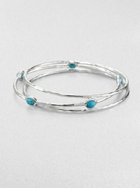 From the Rock Candy® Collection. A trio of hammered, sterling silver bangles accented with colorful, faceted turquoise. Sterling silverTurquoiseDiameter, about 2.5Slip-on styleImported From the Rock Candy® Collection. A trio of hammered, sterling silver bangles accented with colorful, faceted turquoise. Sterling silverTurquoiseDiameter, about 2.5Slip-on styleImported