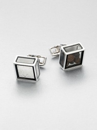 Undeniably unique design of plated brass and glass with real salt and pepper elements.Brass/glassAbout ½ x ½Made in the United Kingdom Undeniably unique design of plated brass and glass with real salt and pepper elements.Brass/glassAbout ½ x ½Made in the United Kingdom