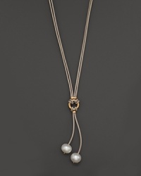Freshwater pearls add rich luster to 14K yellow gold and leather. By Nancy B. Freshwater pearls add rich luster to 14K yellow gold and leather. By Nancy B.