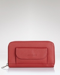 Enduring French style proves practical with this leather wallet from Longchamp. Slip it in your purse to keep your cash (and card) collection très organized. Enduring French style proves practical with this leather wallet from Longchamp. Slip it in your purse to keep your cash (and card) collection très organized.